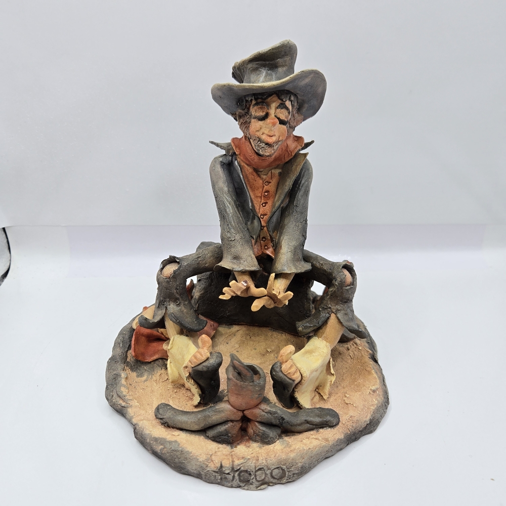 Hand Crafted Cowboy Sculpture - Gray, Orange, and Tan